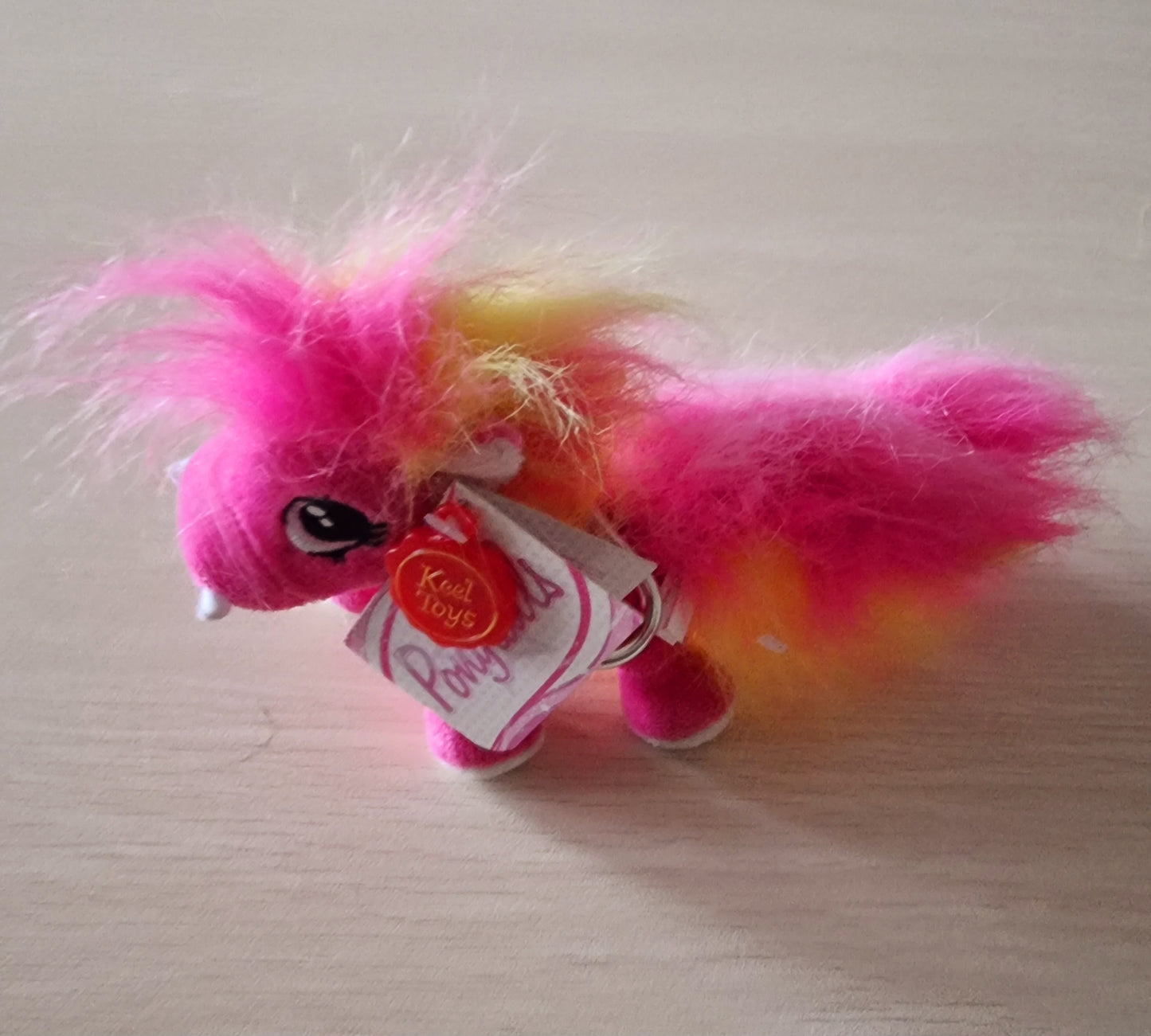 PELUCHE PONY ROSA CARICO