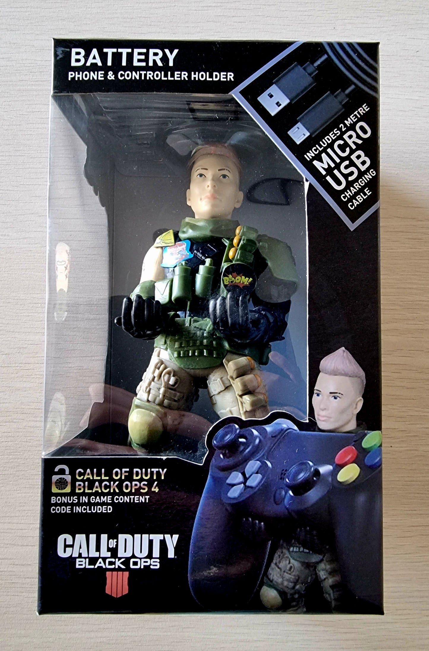 STATUETTA SUPPORTO RICARICA CABLE GUY