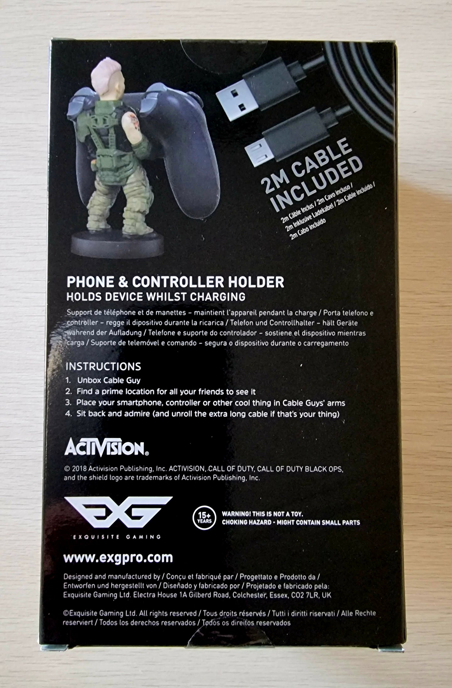 STATUETTA SUPPORTO RICARICA CABLE GUY
